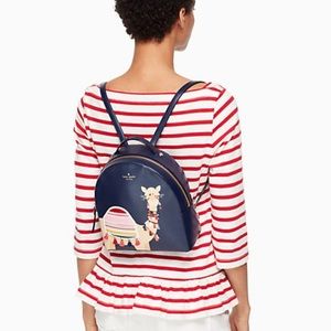 Gently used Kate Spade camel back pack